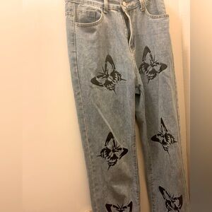 Butterfly Print Faded Denim Jeans